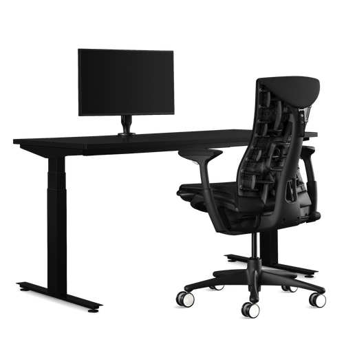 Side view of an Embody Black Gaming Chair, Nevi Gaming Desk and Ollin Monitor Arm from Herman Miller Gaming