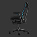Side view of an Embody Gaming Chair in Cyan blue from Herman Miller Gaming