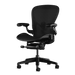 Front view of an onyx black Aeron C office chair from Herman Miller Gaming, designed by Bill Stumpf & Don Chadwick