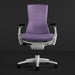 Straight-on view of a purple and white Herman Miller X Logitech Embody gaming chair in Amethyst