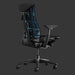 Rear angle view of an Embody Gaming Chair in Cyan blue from Herman Miller Gaming